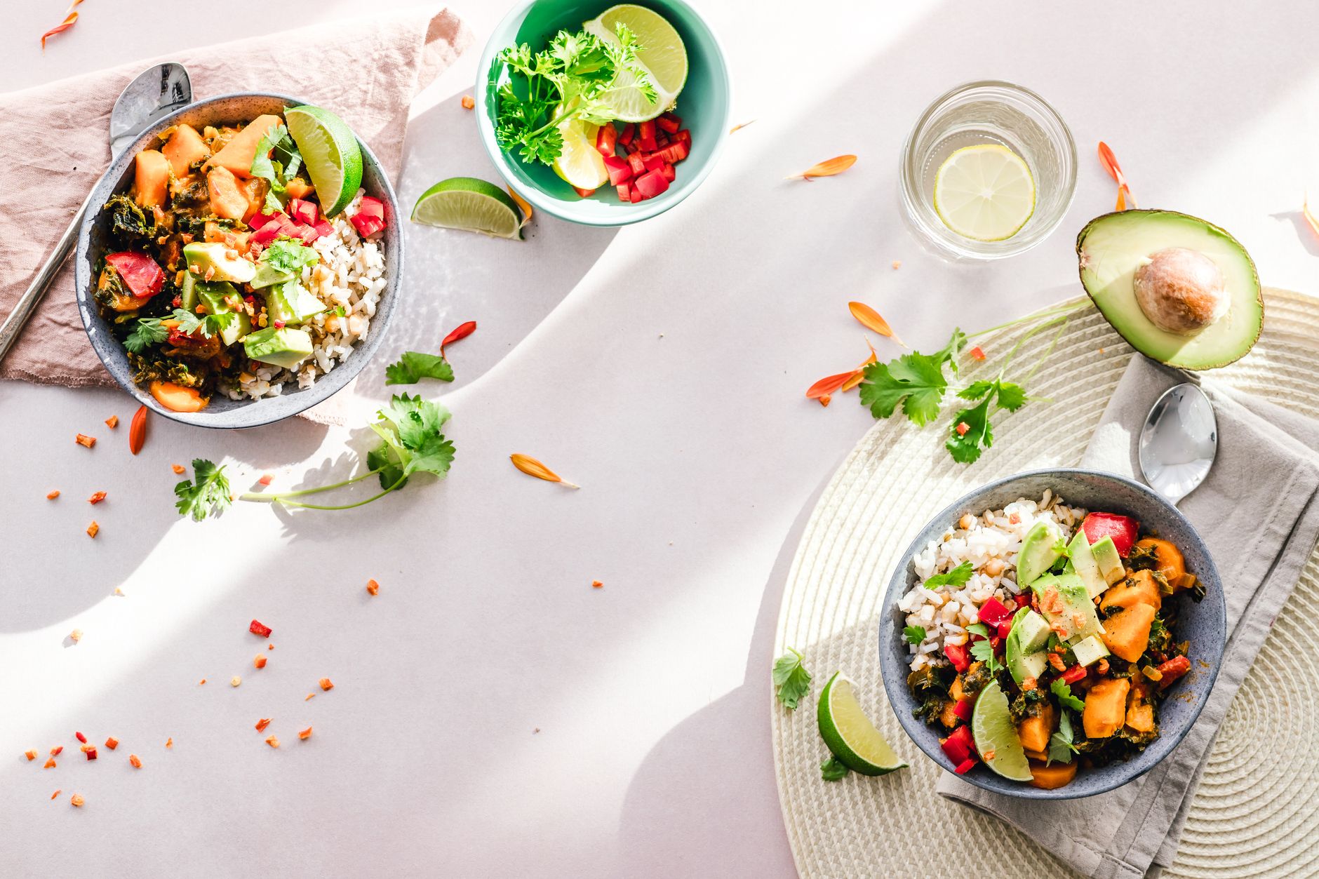 Top-down view of vibrant vegan bowls filled with fresh vegetables, perfect for a healthy meal. — American BBQ Food in Sydney:
