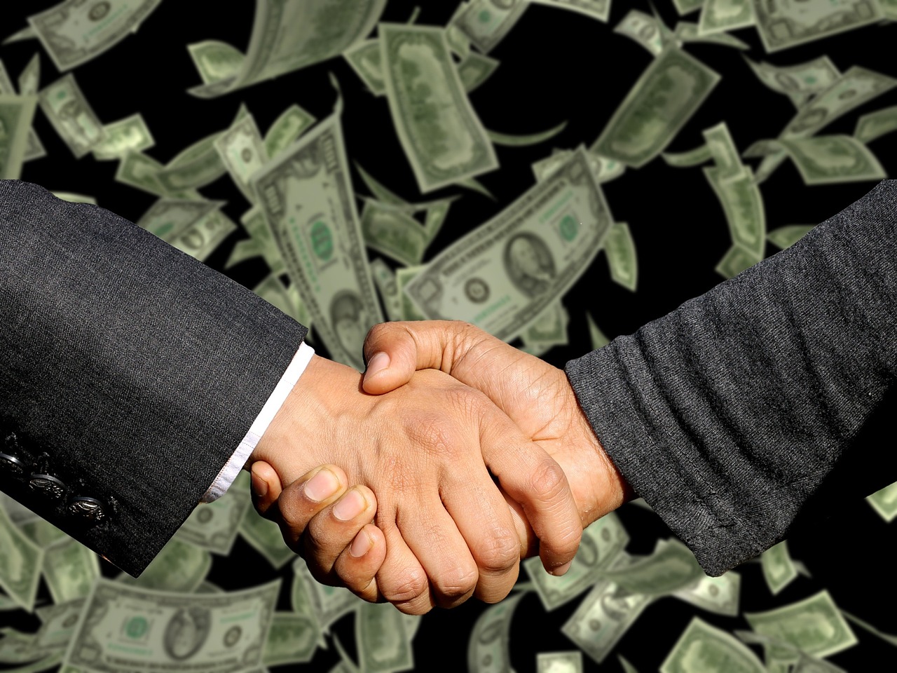 Handshake, agreement, trade — The Best Karaoke Part-Time Jobs for Music Lovers