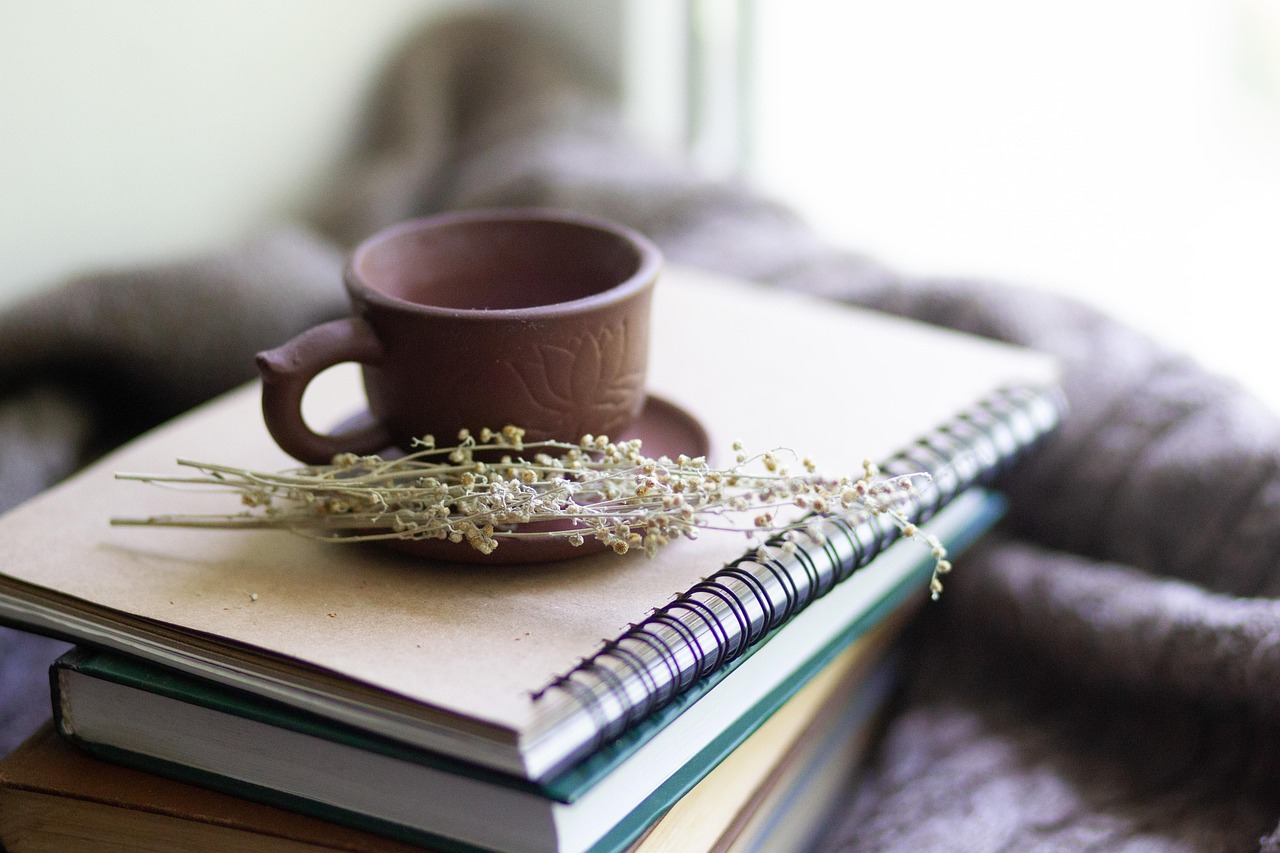 Books, cup, herbs — The Importance of Green Spaces