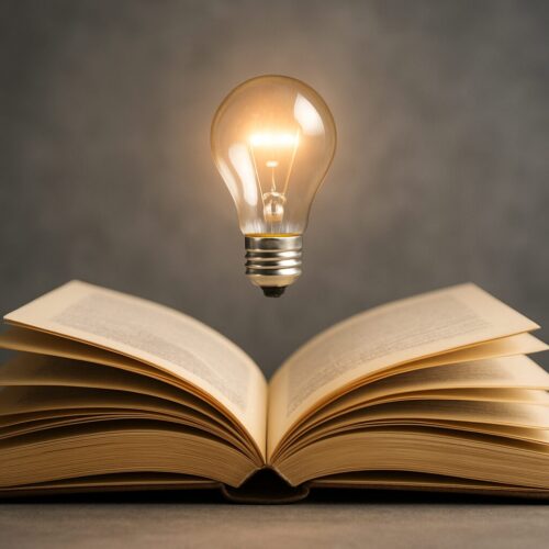 An open book with a glowing light bulb hovering above it, symbolizing ideas and intellectual curiosity.